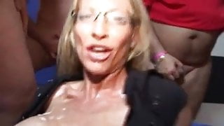 Mature blonde gangbanged