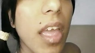 Pretty eyed Indian Suravinda takes a load in her mouth
